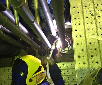 When to use an open head in orbital welding?